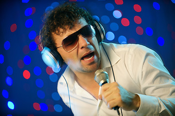 Image showing Male DJ with microphone