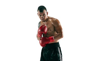 Image showing Full length portrait of muscular sportsman with prosthetic leg, copy space. Male boxer in red gloves.