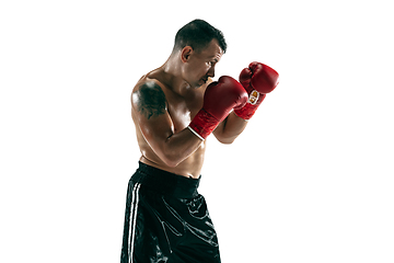 Image showing Full length portrait of muscular sportsman with prosthetic leg, copy space. Male boxer in red gloves.