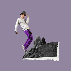 Image showing Modern design, contemporary art collage. Inspiration, idea, trendy urban magazine style. Young man standing on mountains on pastel purple background