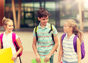 Image showing group of happy elementary school students walking