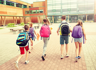 Image showing group of happy elementary school students running