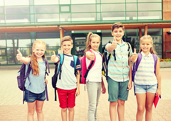 Image showing happy elementary school students showing thumbs up