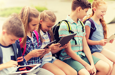 Image showing group of happy elementary school students talking