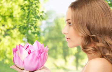 Image showing beautiful woman with pink lotus flower