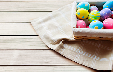 Image showing close up of colored easter eggs in basket