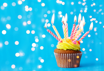 Image showing birthday cupcake with many burning candles
