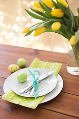 Image showing easter egg, plates, cutlery and tulip flowers