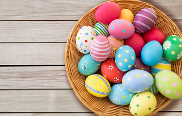 Image showing close up of colored easter eggs in basket