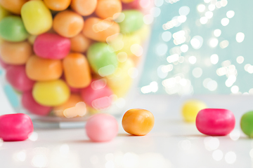 Image showing close up of colorful candy drops on table