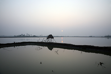 Image showing A stunning sunrise looking over the holiest of rivers in India. Ganges delta in Sundarbans, West Bengal, India.