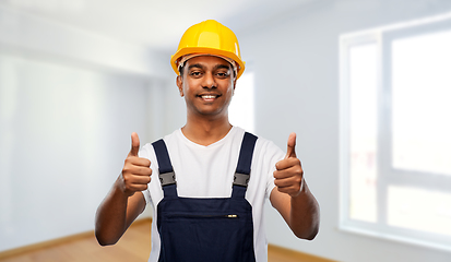 Image showing happy indian worker or builder showing thumbs up