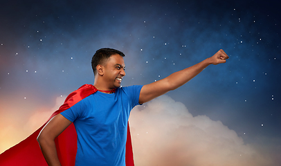 Image showing indian man in superhero cape makes winning gesture