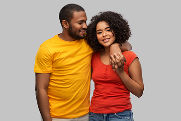 Image showing happy african american couple hugging