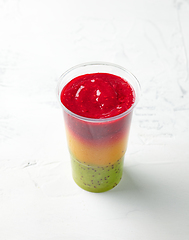 Image showing glass of colorful smoothie