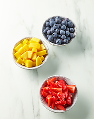 Image showing bowls of fresh fruit and berries