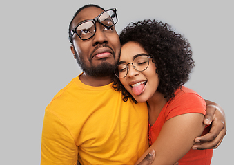 Image showing happy african american couple in glasses hugging