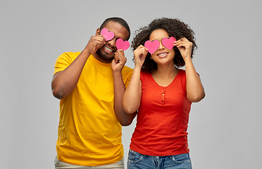 Image showing happy african american couple with hearts