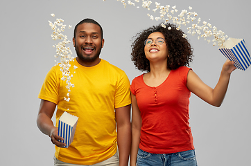 Image showing happy african american couple with popcorn