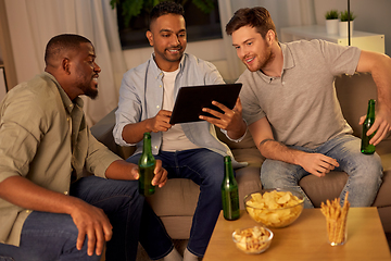 Image showing male friends with tablet pc drinking beer at home