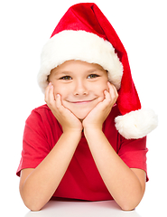 Image showing Portrait of a cute little girl in santa hat