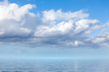 Image showing blue sky with white clouds over the sea