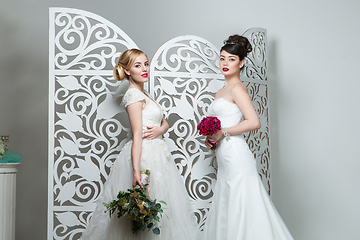 Image showing beautiful girls in wedding gown