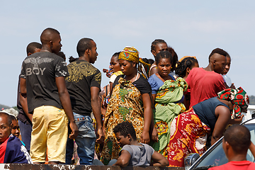 Image showing Malagasy woman waiting for transport ship, Nosy Be, Madagascar