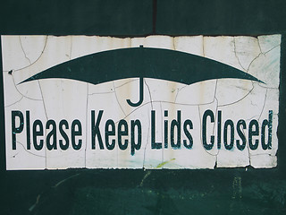 Image showing please keep lids closed sign