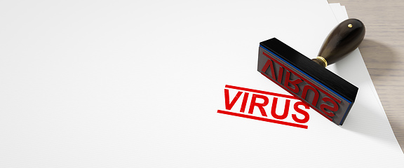 Image showing paper background with a stamp and the word virus