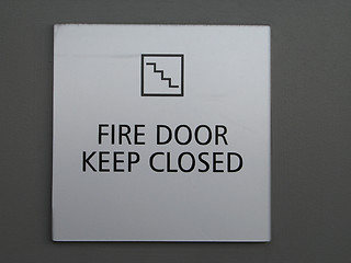 Image showing a grey fire door keep closed sign