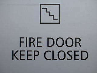 Image showing a grey fire door keep closed sign