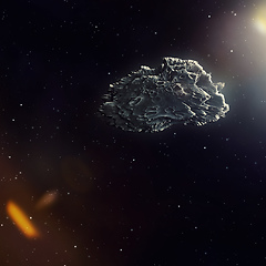 Image showing meteorite in the deep space with sun flare