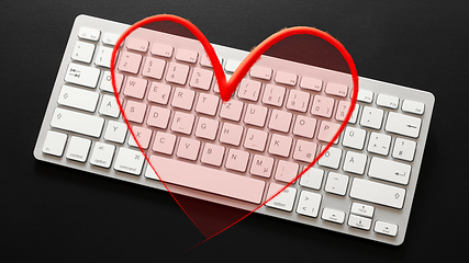 Image showing typical computer keyboard with a red heart overlay