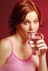 Image showing Girl with glass