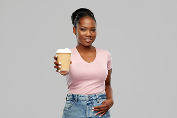 Image showing happy african american woman drinking coffee