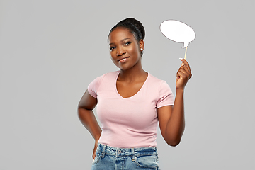 Image showing happy african american woman holding speech bubble