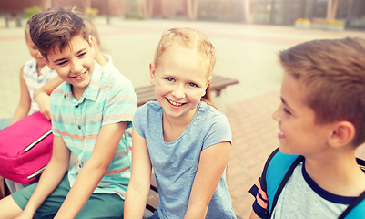 Image showing group of happy elementary school students talking