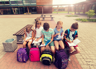 Image showing group of happy elementary school students outdoors