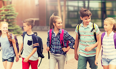 Image showing group of happy elementary school students walking