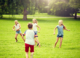 Image showing happy kids running and playing game outdoors