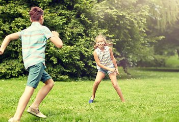 Image showing happy kids running and playing game outdoors