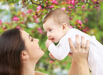 Image showing mother with baby over spring garden background