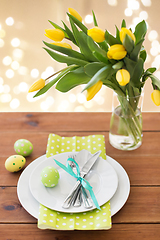 Image showing easter egg, plates, cutlery and tulip flowers