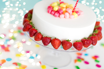 Image showing close up of birthday cake with strawberries