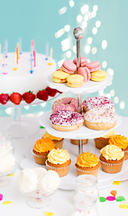 Image showing food and drinks on table at birthday party