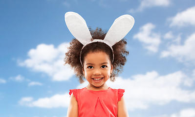 Image showing happy little girl wearing easter bunny ears