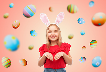 Image showing happy girl wearing easter bunny ears headband