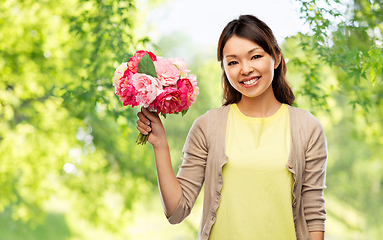 Image showing happy asian woman with bunch of flowers