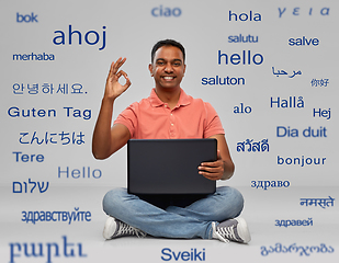 Image showing happy indian man with laptop computer showing ok